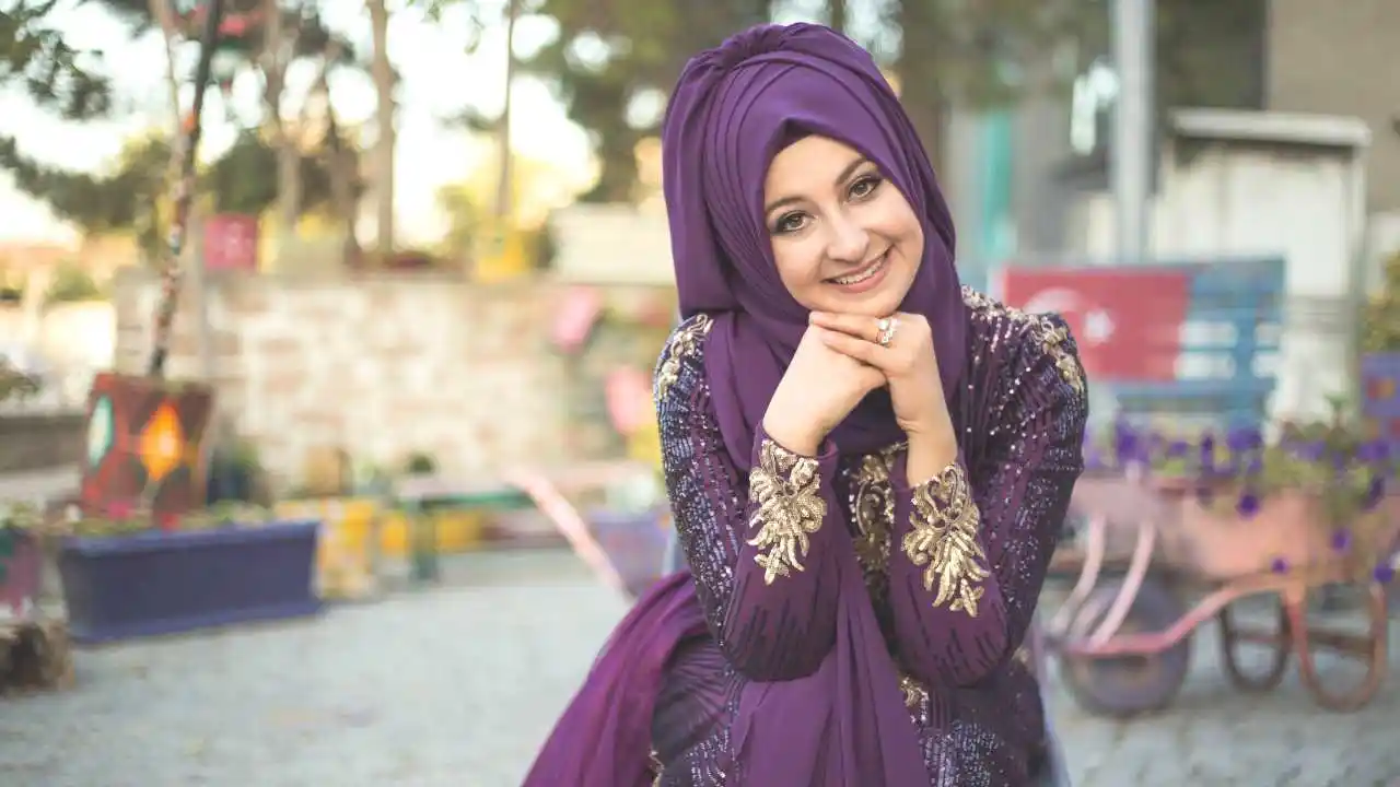 Purple muslimah gown with decorations