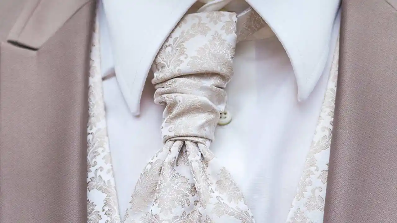 groom in suit, shirt, tie and vest