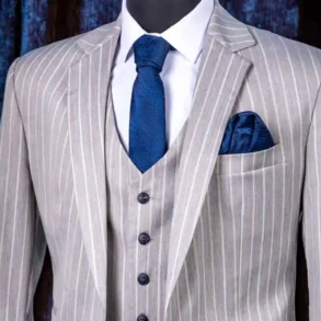 striped suit, vest and blue tie