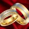 wedding bands with gems on a red velvet
