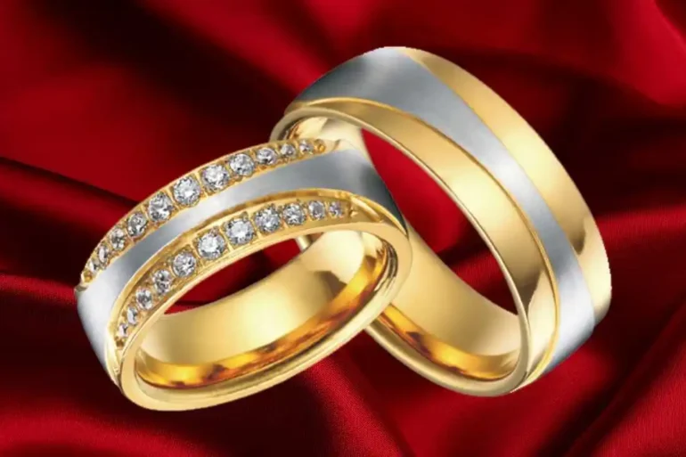 wedding bands with gems on a red velvet